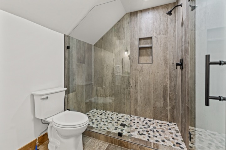 Bedroom and bathroom by Nicholson Construction